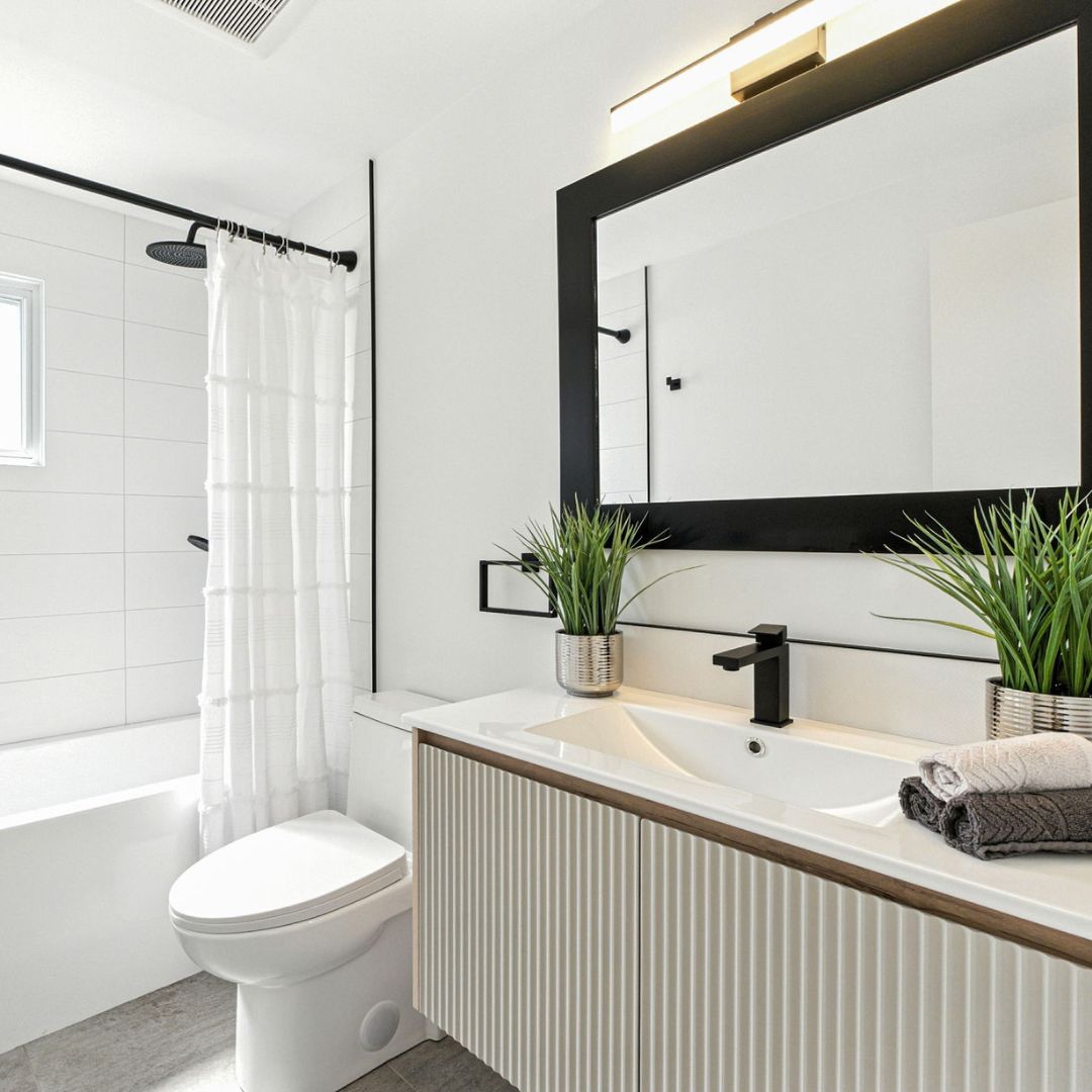 Two bathroom and kitchen renovation project by Chris Tile in Toronto