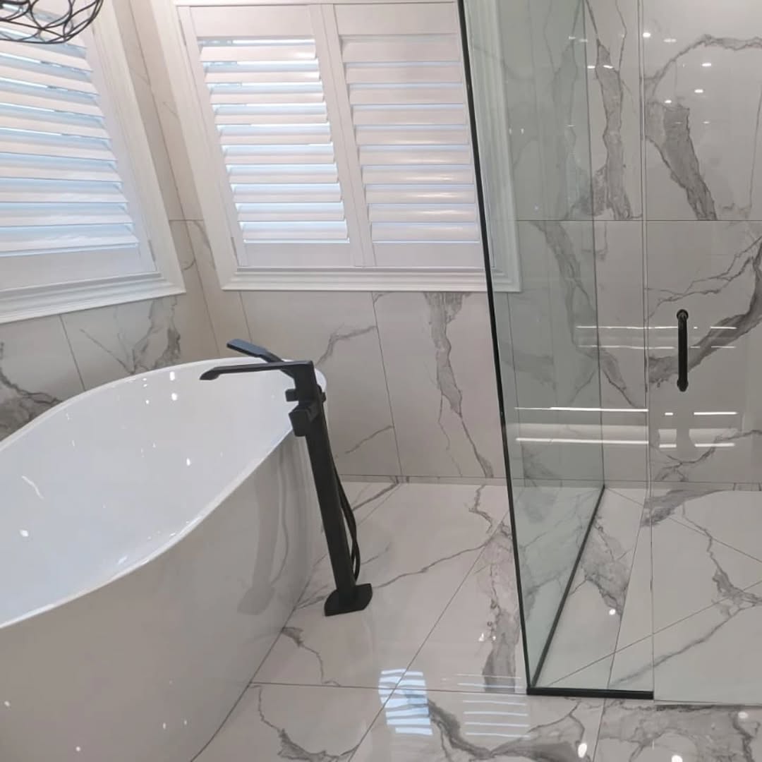 Large format Calacatta porcelain floor and wall tile Toronto bathroom renovation