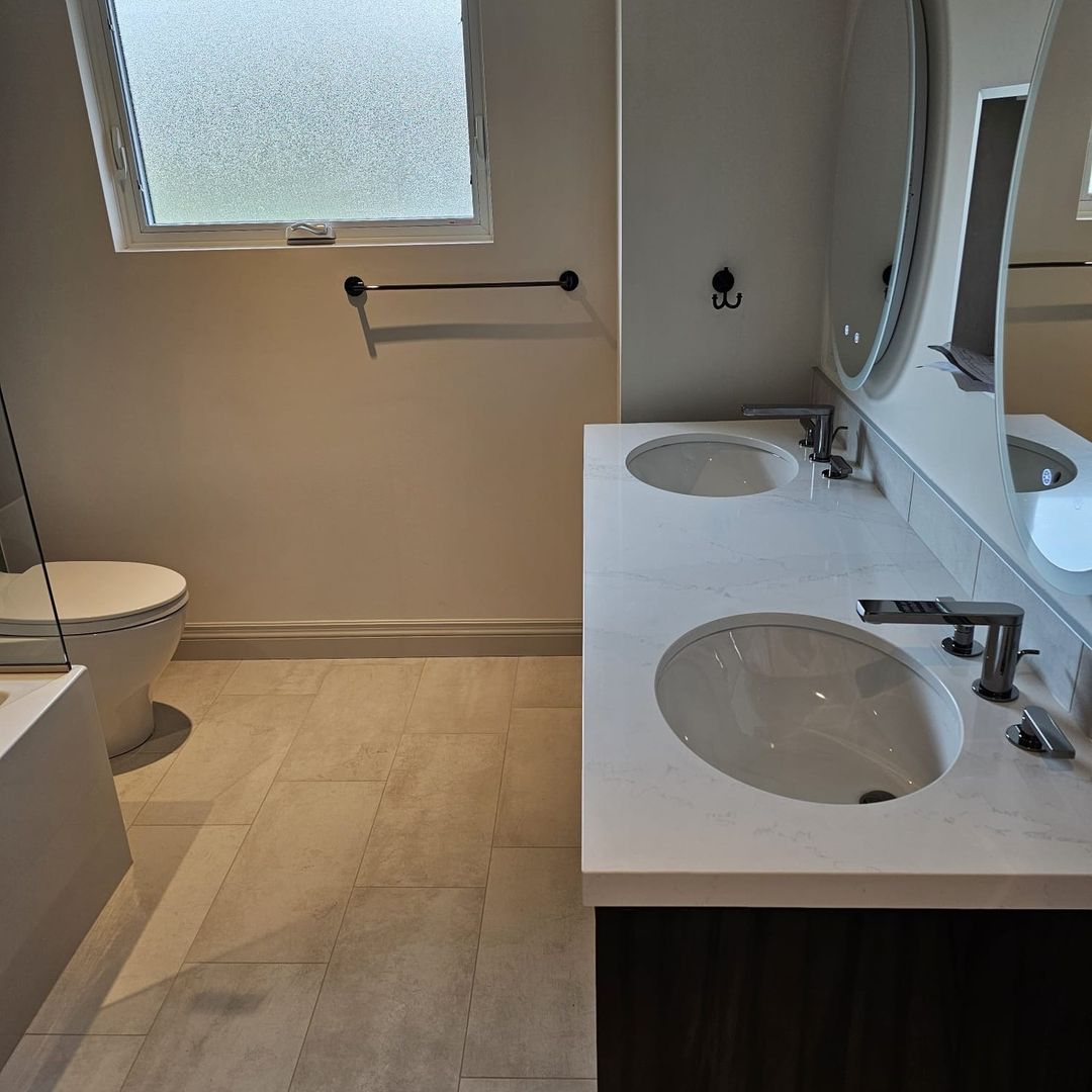 Bathroom renovation detail - large format tile and premium fixtures - Toronto