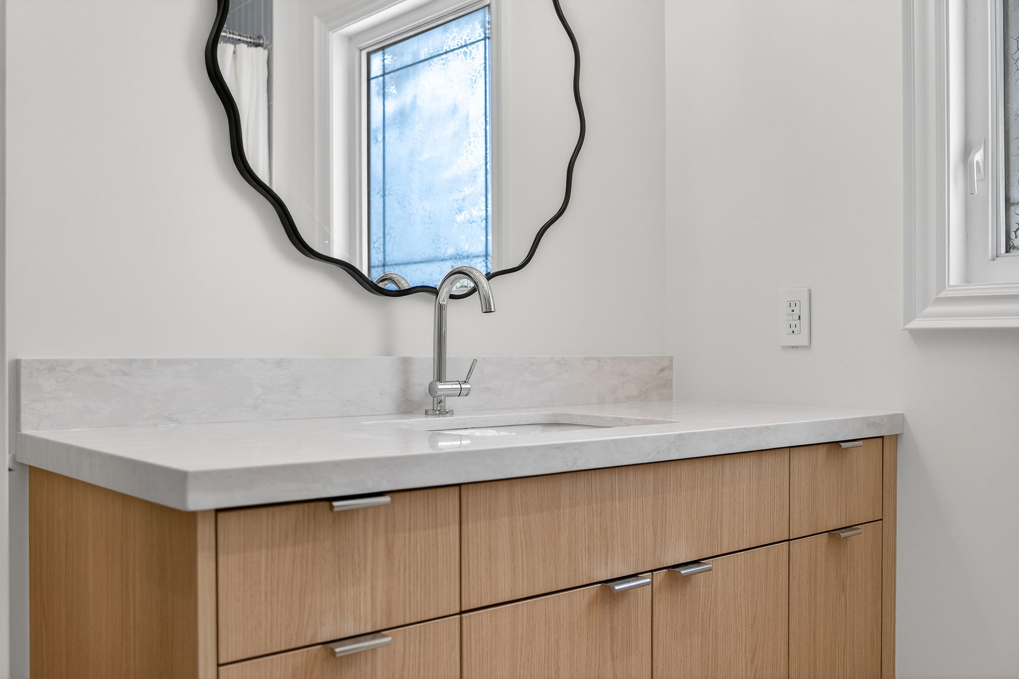 Terrazzo floor tile and chrome fixtures family bathroom Mississauga