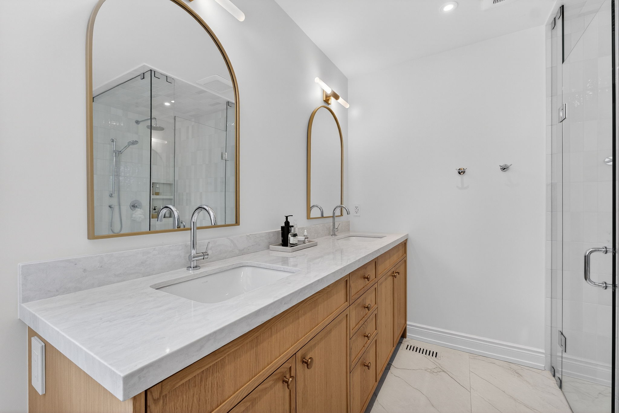 Natural oak double vanity with marble quartz countertop and gold hardware Mississauga