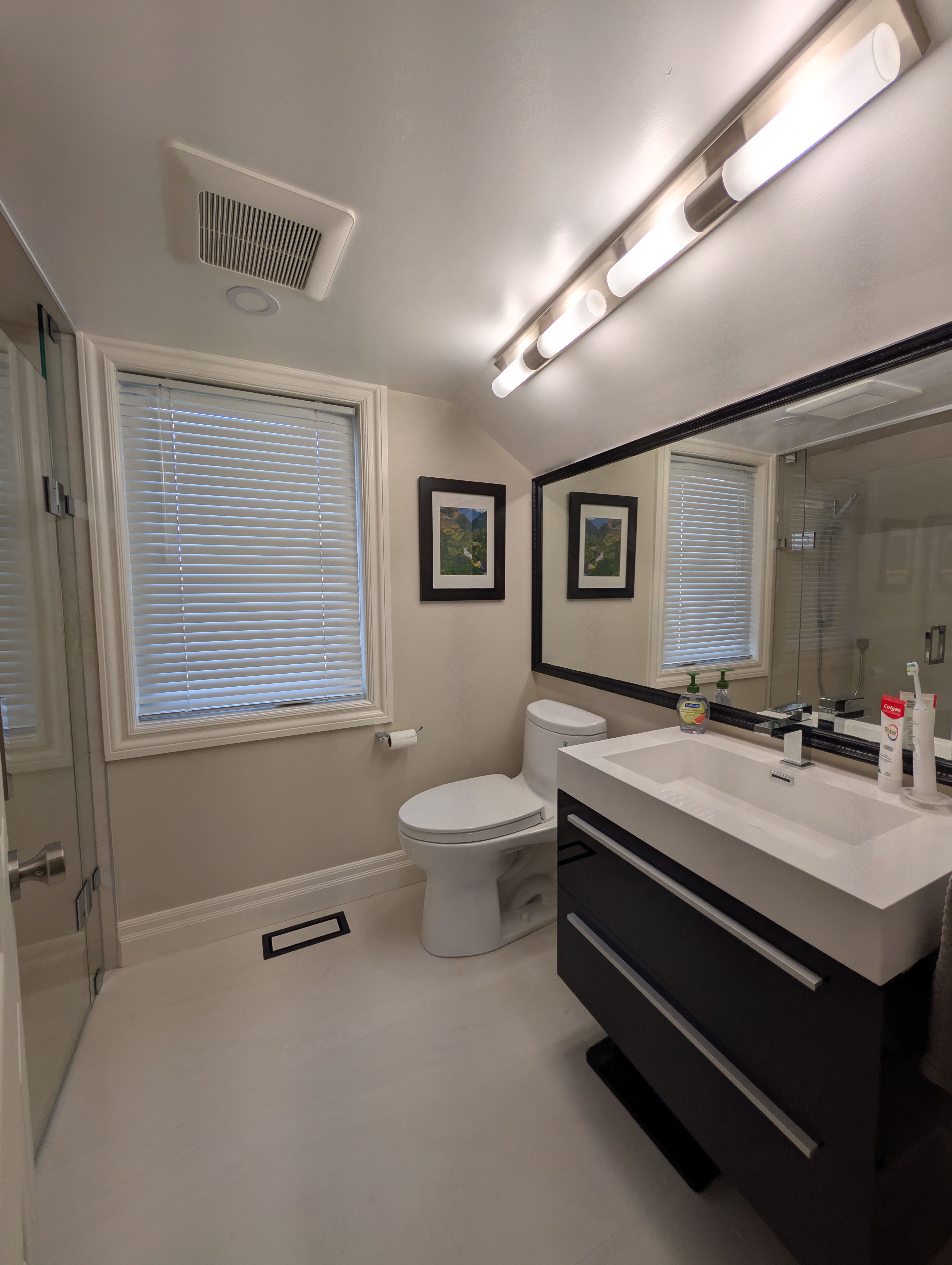 Vaulted ceiling curbless shower with LED niche Mississauga bathroom renovation