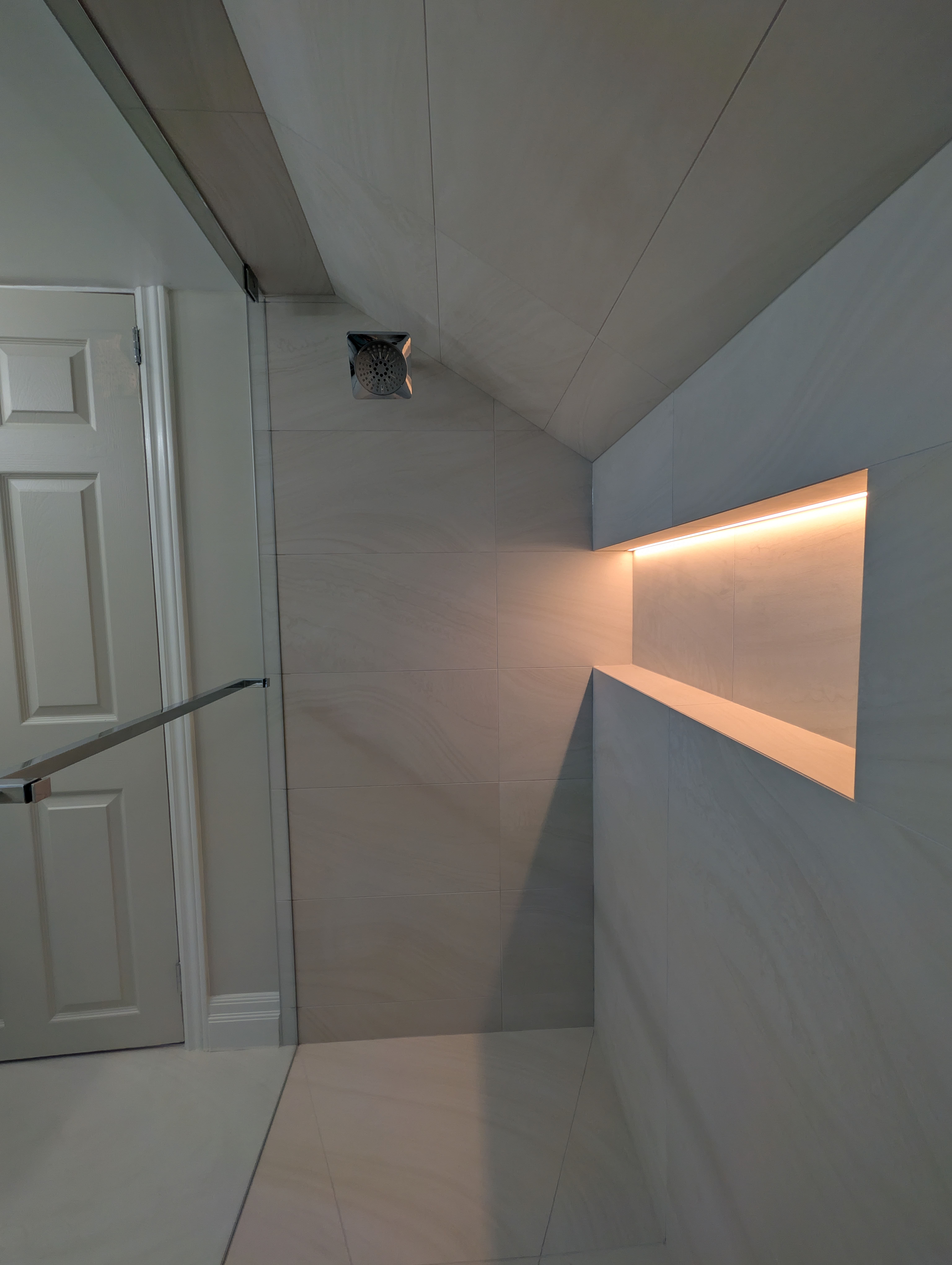 Frameless glass shower with handheld and rain head Mississauga